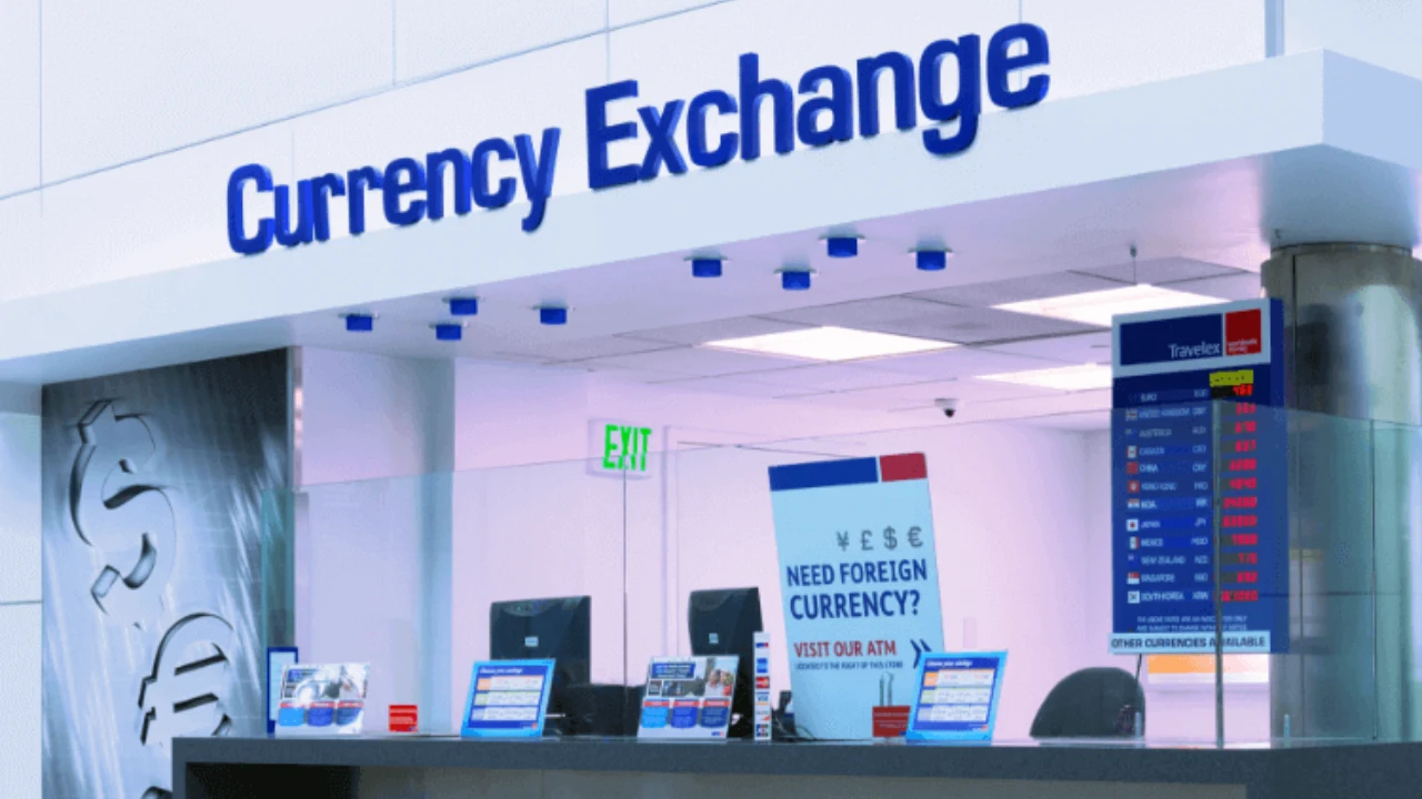 Is it Futile to exchange money at the Airport. Currency exchange counter with foreign rates display.  